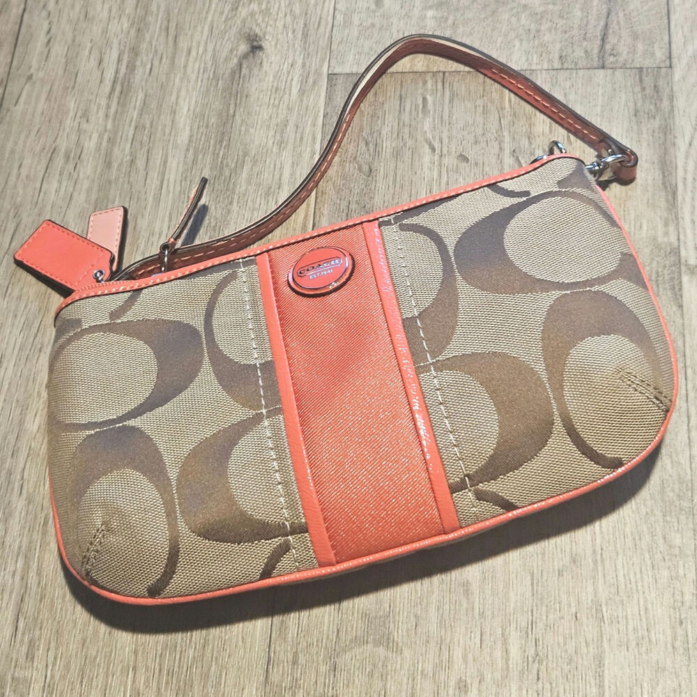 COACH Peach and Camel Canvas Wristlet